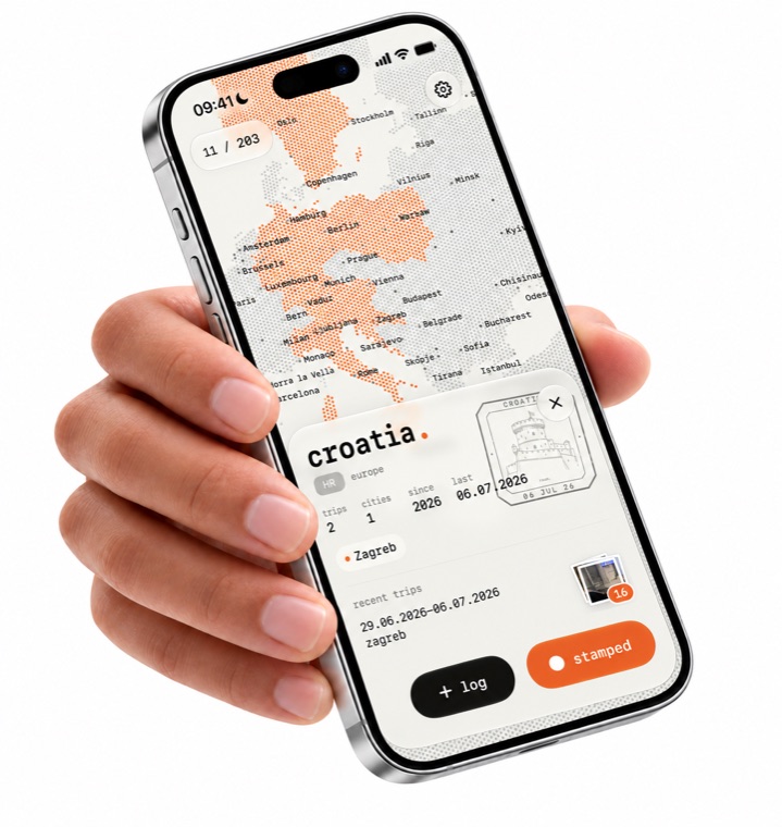 a hand holding an iPhone showing the record for Croatia in light mode.
