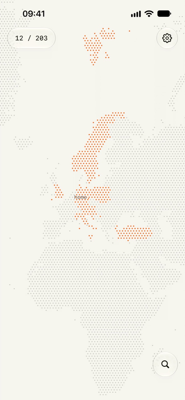 raum. open on an iPhone, held in a hand: the world as a grid of dots, the visited countries in orange.